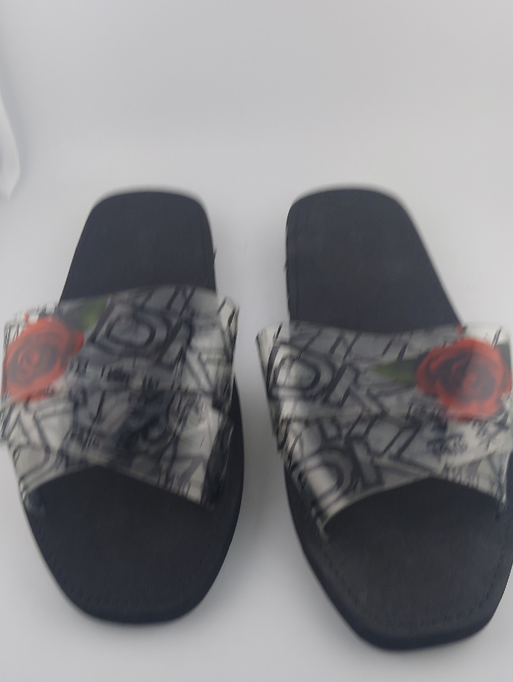 DNNY Black Slide Sandals with Clear Rose-Print Strap